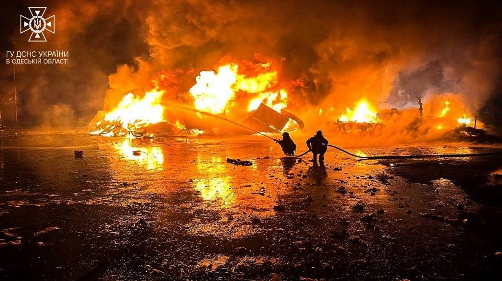 This handout photograph taken and released by Ukrainian emergency service on October 6, 2023, shows firefighters working to extinguish a fire on the port infrastructure on the Danube river, in the Odesa region, amid the Russian invasion in Ukraine. (Photo by Handout / UKRAINIAN EMERGENCY SERVICE / AFP) / RESTRICTED TO EDITORIAL USE - MANDATORY CREDIT "AFP PHOTO / Ukrainian emergency service  " - NO MARKETING NO ADVERTISING CAMPAIGNS - DISTRIBUTED AS A SERVICE TO CLIENTS