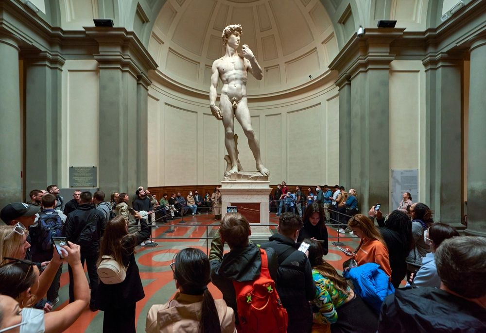 Florence,,Italy,-,May,6,,2023:,Numerous,Tourists,Near,Michelangelo's