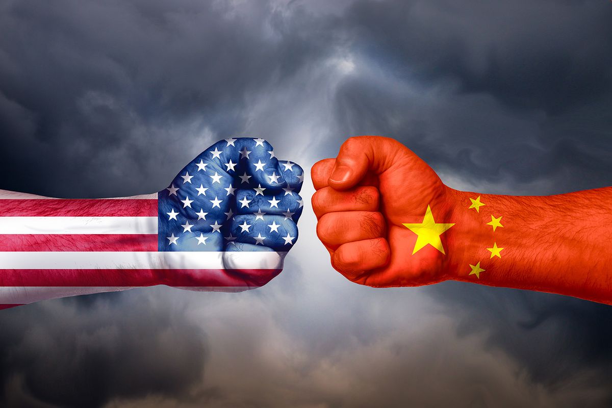 Flags,Of,Usa,And,China,Painted,On,Two,Fists,On