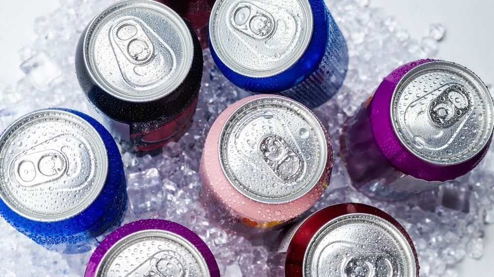 Group,Of,Aluminium,Cans,In,Ice,,Cold,Drink.,Top,View.