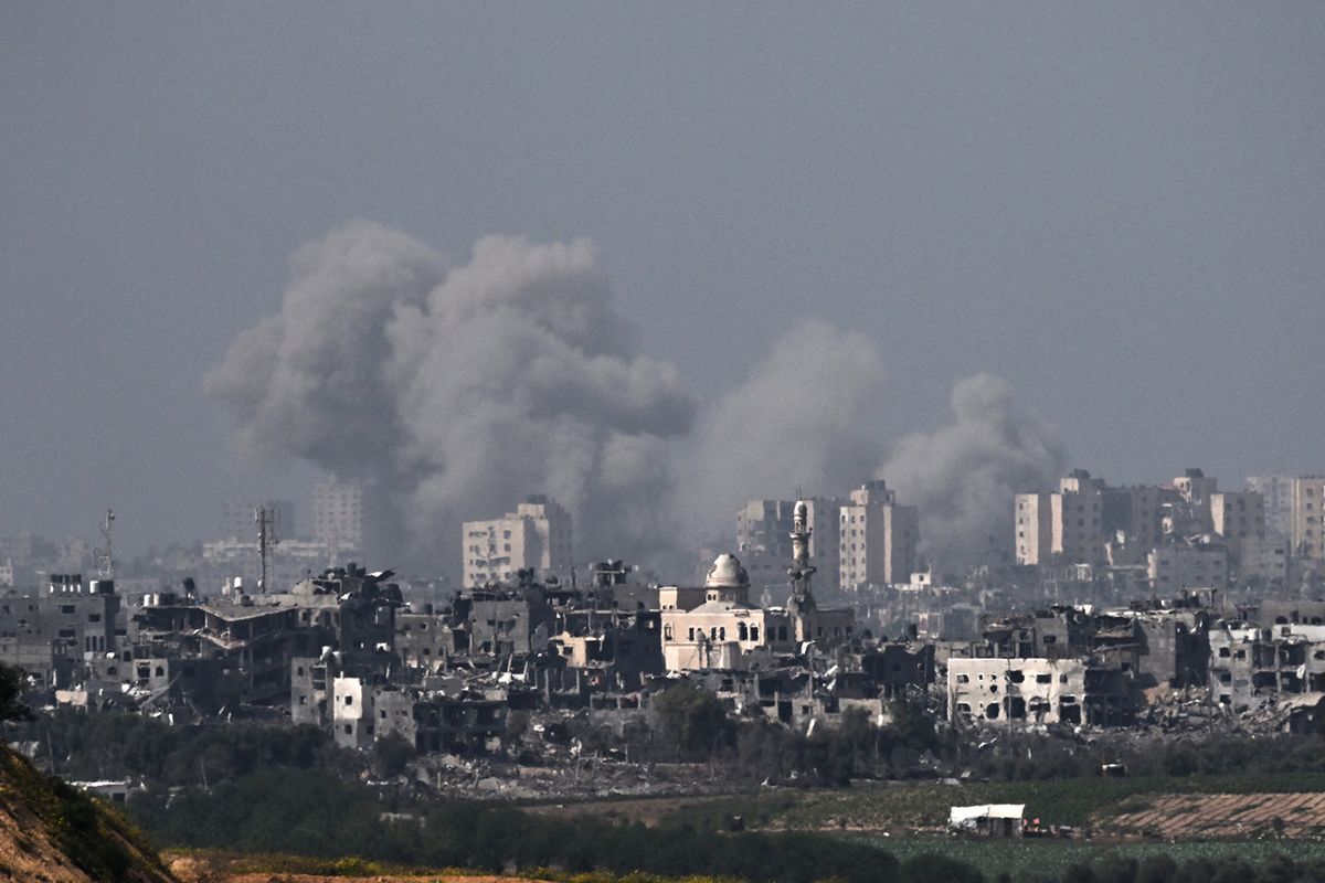 A picture taken from Israel's southern city of Sderot shows smoke billowing during an Israeli airstrike on the northern Gaza Strip on October 24, 2023, amid ongoing battles between Israel and the Palestinian group Hamas. (Photo by Aris MESSINIS / AFP)