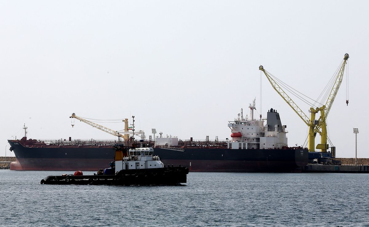 The Iran-flagged oil tanker ship Clavel is docked at Shahid Beheshti Port in the southeastern Iranian coastal city of Chabahar, on the Gulf of Oman, during an inauguration ceremony of new equipment and infrastructure at the port on February 25, 2019. (Photo by ATTA KENARE / AFP)