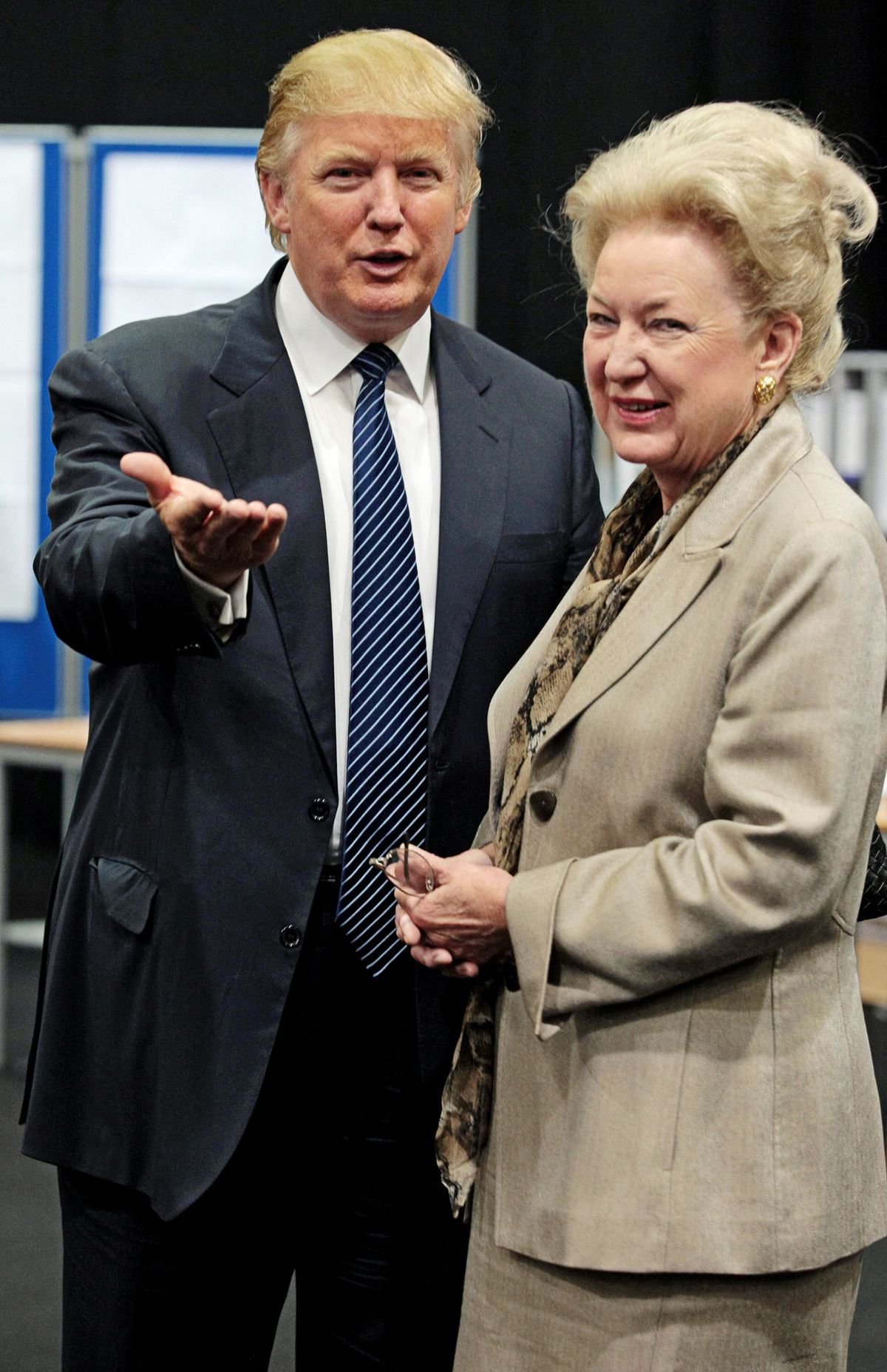 (FILES) Former US president and property tycoon Donald Trump (L) is pictured with his sister Maryanne Trump Barry as they adjourn for lunch during a public inquiry over his plans to build a golf resort near Aberdeen, at the Aberdeen Exhibition & Conference centre, Scotland, on June 10, 2008. Donald Trump's older sister, a former judge who fell out with him during the later stages of his presidency, has died in New York at the age of 86, US media reported on November 13, 2023. Maryanne Trump Barry passed away at her home in Manhattan, the New York Times said, describing her as "both his protector and critic throughout their lives." (Photo by Ed JONES / AFP)