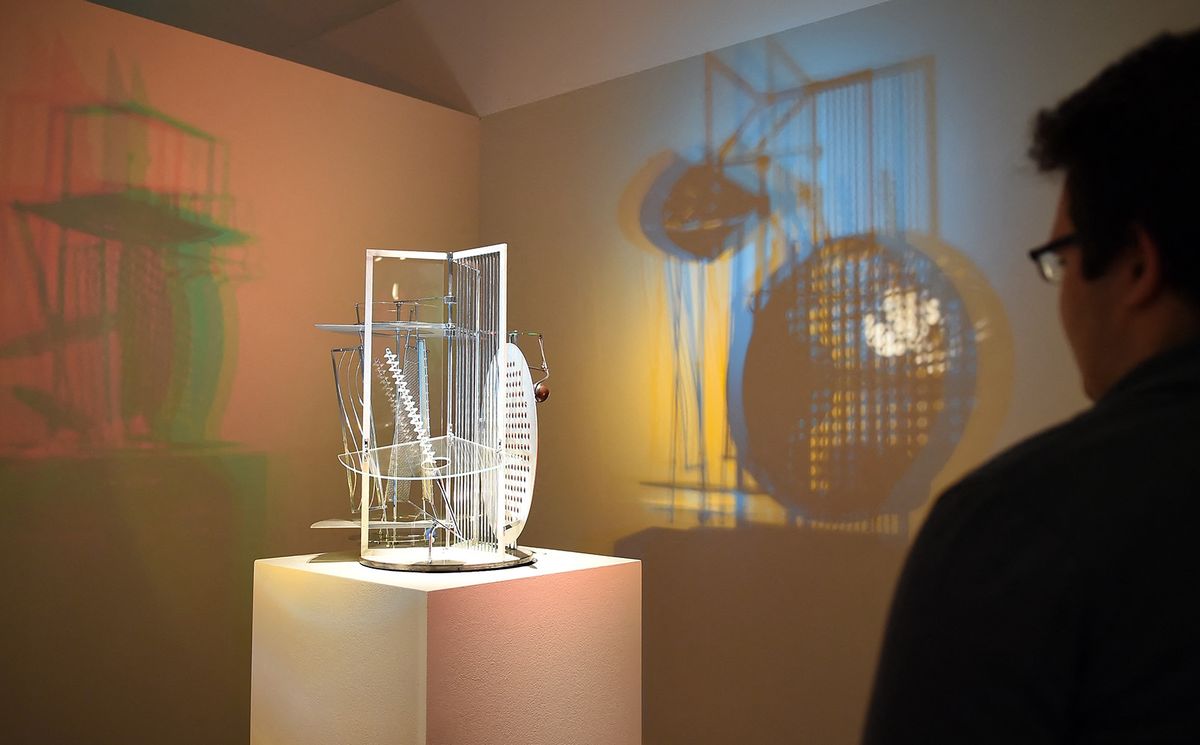 On March 16, 2015, a visitor to the Bauhaus Archive Museum of Design in the newly designed exhibition rooms in Berlin will see a light prop for an electric stage (from 1930) by the artist Laszlo Moholy-Nagy. The museum redesigned the permanent exhibition and presented 100 new objects in a special exhibition. Photo: Britta Pedersen / dpa | usage worldwide (Photo by BRITTA PEDERSEN / dpa-Zentralbild / dpa Picture-Alliance via AFP)