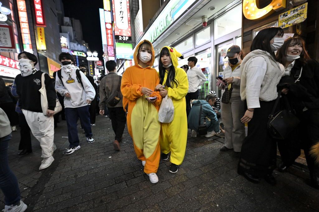 Halloween in TokyoTOKYO, JAPAN - OCTOBER 31 : People wearing costumes walk in Tokyo street as they take part to events to celebrate the Halloween in Tokyo, Japan, in the middle of the night on October 31, 2022. (Photo by David MAREUIL/Anadolu Agency via Getty Images)