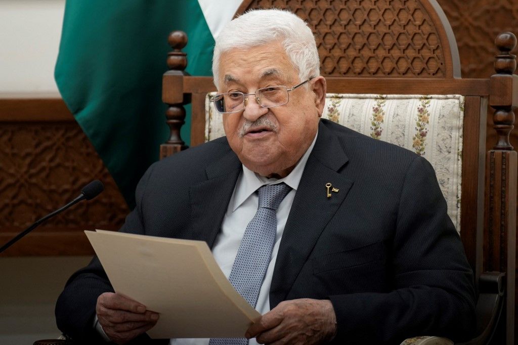 Palestinian President Mahmoud Abbas speaks during a meeting with French President on October 24, 2023 in the West Bank city of Ramallah. Macron's visit comes more than two weeks after Hamas militants stormed into Israel from the Gaza Strip and killed at least 1,400 people, according to Israeli officials while Israel continues a relentless bombardment of the Gaza Strip and prepares for a ground offensive with more than 5,000 Palestinians, mainly civilians, killed so far across the Palestinian territory, according to the latest toll from the Hamas health ministry in Gaza. (Photo by Christophe Ena / POOL / AFP)