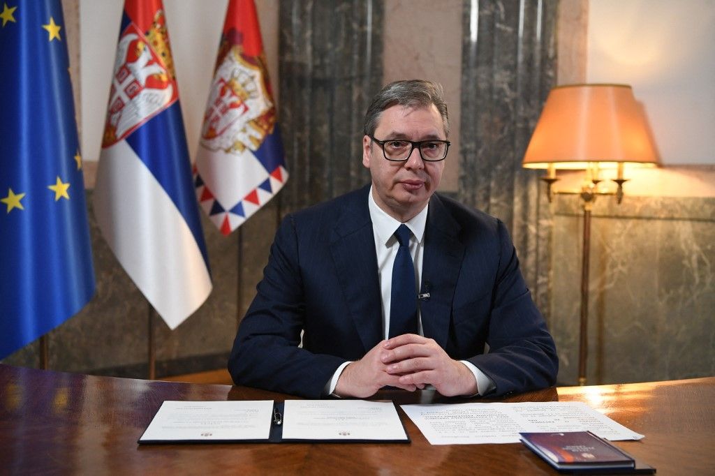 This handout photograph taken and released by Serbia Presidential press service on November 1, 2023, shows Serbian President Aleksandar Vucic after signing a decree to dissolve the parliament and schedule an early election in Belgrade. Serbia will hold snap elections on December 17, less than two years after the Serbian Progressive Party won the the last polls, the Balkan country's president said on November 1, 2023. Along with parliamentary elections, Serbian citizens will cast ballots in 65 municipalities, including the capital Belgrade. Serbian President Aleksandar Vucic made the announcement in a live broadcast dissolving parliament. (Photo by DIMITRIJE GOLL / Serbia's Presidential press service / AFP) / RESTRICTED TO EDITORIAL USE - MANDATORY CREDIT "AFP PHOTO / HANDOUT /  SERBIA'S PRESIDENTIAL PRESS SERVICE " - NO MARKETING NO ADVERTISING CAMPAIGNS - DISTRIBUTED AS A SERVICE TO CLIENTS