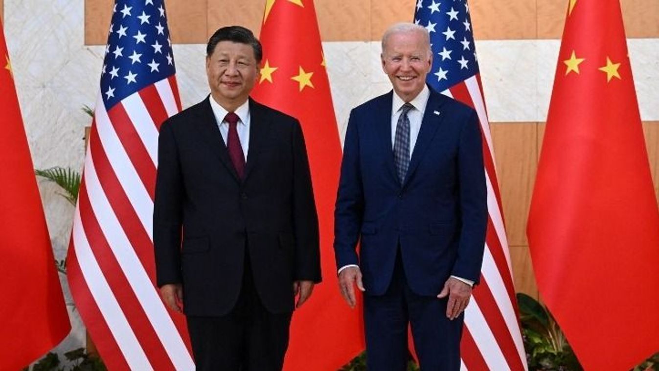 US President Joe Biden (R) and China's President Xi Jinping (L) meet on the sidelines of the G20 Summit in Nusa Dua on the Indonesian resort island of Bali on November 14, 2022. (Photo by SAUL LOEB / AFP)