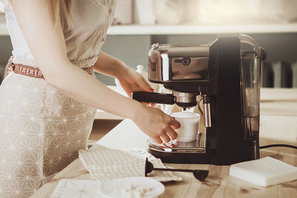 Woman,Making,Fresh,Espresso,In,Coffee,Maker.,Coffee,Machine,Makes