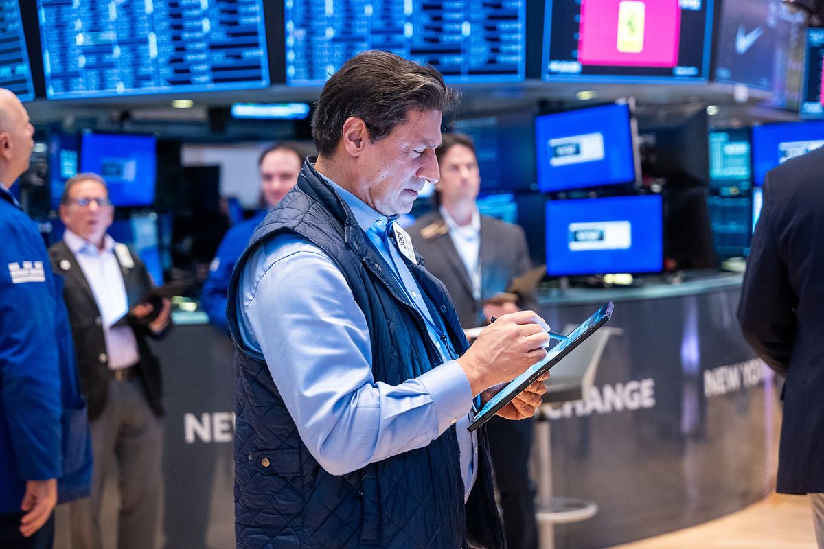 NEW YORK, NEW YORK - NOVEMBER 15: Traders work on the floor of the New York Stock Exchange (NYSE) on November 15, 2023 in New York City. The Dow was up again in morning trading after news of lower than expected inflation readings encouraged investors.  (Photo by Spencer Platt/Getty Images)