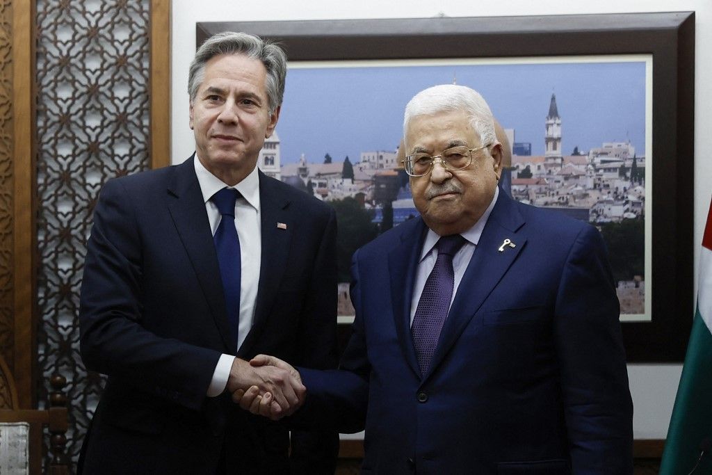 US Secretary of State Antony Blinken (L) shakeshands with Palestinian president Mahmud Abbas at the Palestinian Muqataa Presidential Compound in the West Bank city of Ramallah on November 5, 2023, amid ongoing battles between Israel and the militant group Hamas. Blinken arrived in Ramallah under tight security to meet with Palestinian Authority president Mahmud Abbas, who denounced what he described as a "genocide" in Gaza, where the Hamas-run health ministry said on November 5, 2023, at least 9,770 people had been killed in nearly a month of bombardment. (Photo by JONATHAN ERNST / POOL / AFP)