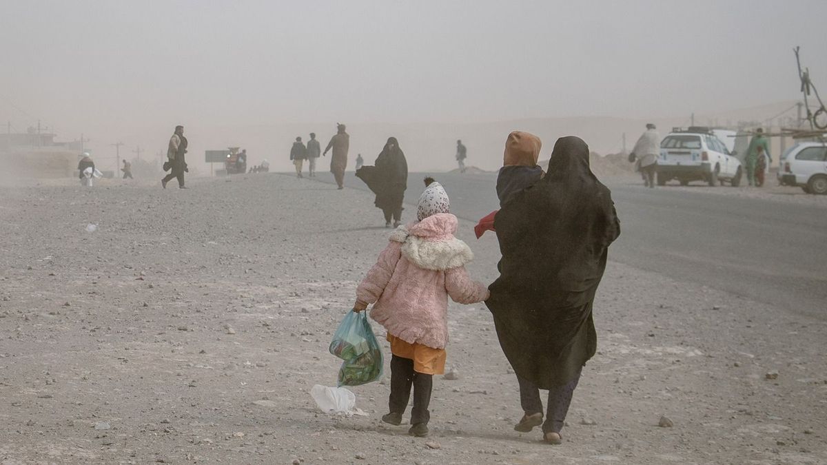 10/17/2023, Herat, Afghanistan. People are commuting along a road during a sandstorm in Herat, Afghanistan. (Photo by Esmatullah Habibian / Middle East Images / Middle East Images via AFP)