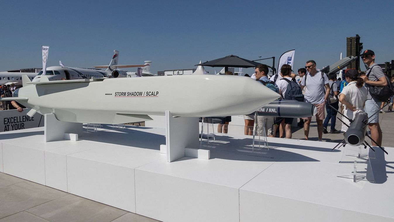 SCALP Missile At Paris Air Show
Visitors are gathered around a SCALP EG / STORM SHADOW low-observable, long-range air-launched cruise missile, an air to surface weapon from the European manufacturer MBDA at the company's booth at International Paris Air Show 2023 in Le Bourget Airport. The Long Range Autonomous Cruise Missile System carries a warhead with a unit cost around 2.500.000 USD. Next to the SCALP EG system are other like  BRIMESTONE, SPEAR, SEA VENOM / ANL, AKERON LP. Paris, France on June 2023 (Photo by Nicolas Economou/NurPhoto) (Photo by Nicolas Economou / NurPhoto / NurPhoto via AFP)