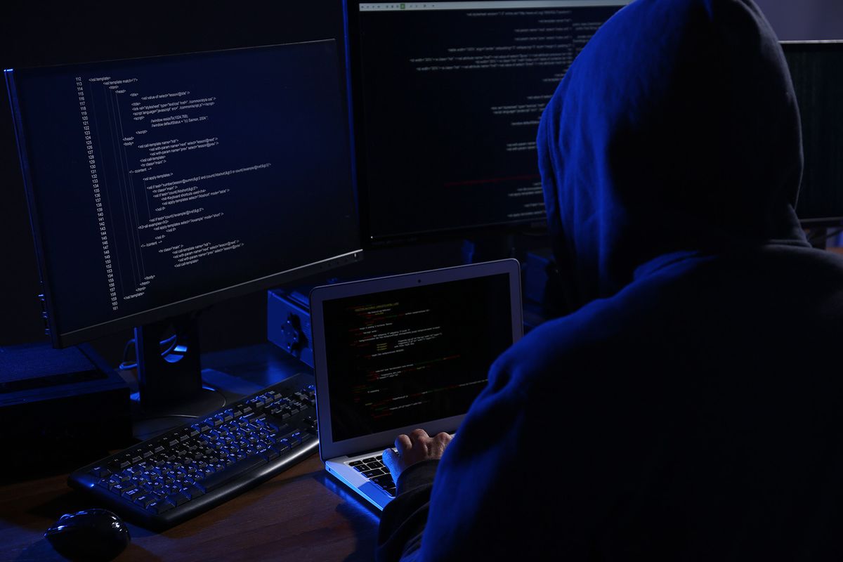 Hacker,With,Computers,In,Dark,Room.,Cyber,Crime