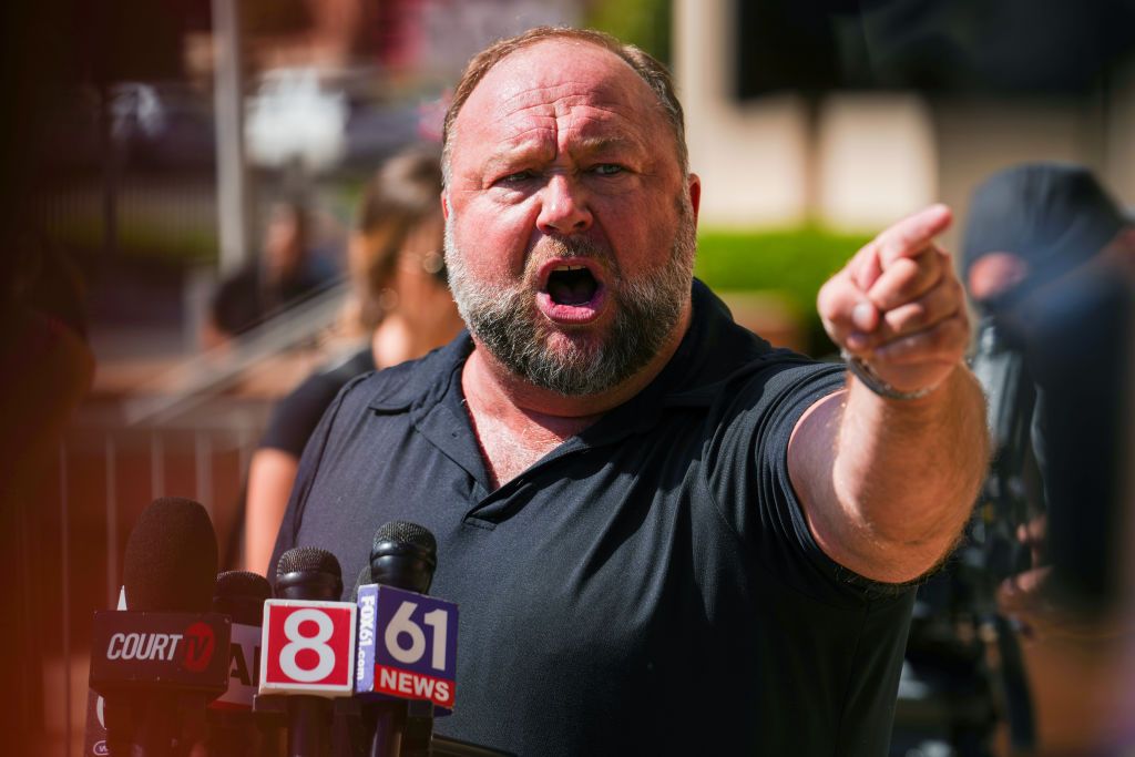 Alex Jones Speaks To The Media Outside The Sandy Hook Trial In Waterbury, ConnecticutWATERBURY, CONNECTICUT - SEPTEMBER 21: InfoWars founder Alex Jones speaks to the media outside Waterbury Superior Court during his trial on September 21, 2022 in Waterbury, Connecticut. Jones is being sued by several victims' families for causing emotional and psychological harm after they lost their children in the Sandy Hook massacre. A Texas jury last month ordered Jones to pay $49.3 million to the parents of 6-year-old Jesse Lewis, one of 26 students and teachers killed in the shooting in Newtown, Connecticut. (Photo by Joe Buglewicz/Getty Images)