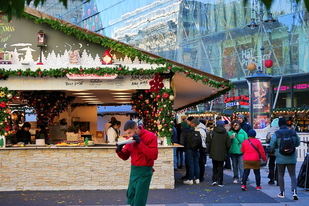 Budapest,,Hungary,-,November,18,,2023:,Christmas,Market,Pavilions,AtBudapest, Hungary - November 18, 2023: Christmas market pavilions at Vorosmarty square. Vörösmarty.