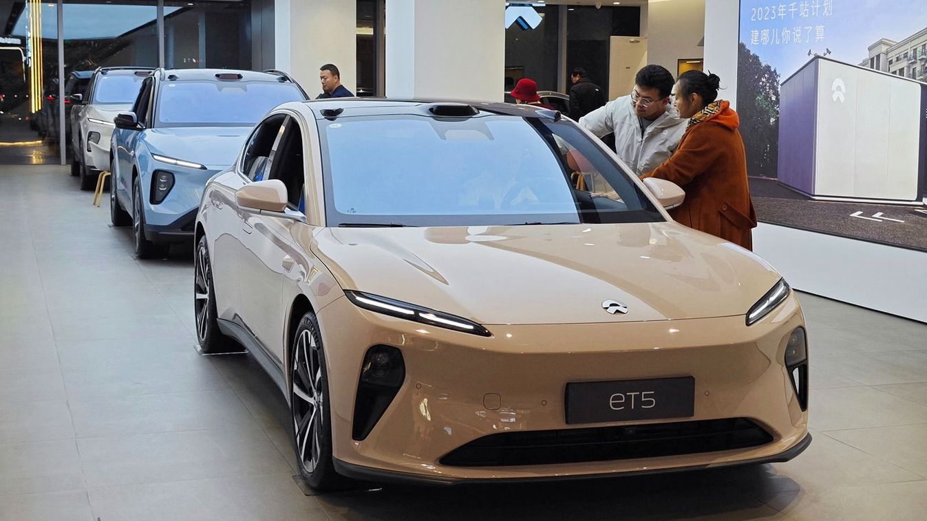 Citizens are learning about ET5 models at a NIO auto store in Yantai, Shandong province, China, on November 26, 2023. (Photo by Costfoto/NurPhoto) (Photo by CFOTO / NurPhoto / NurPhoto via AFP)