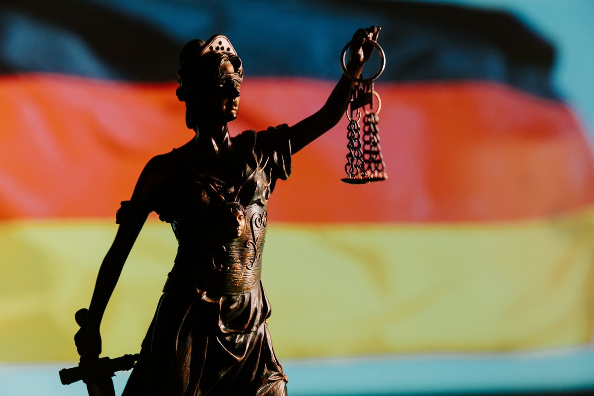 Lady,Justice,Against,Germany,Flag.