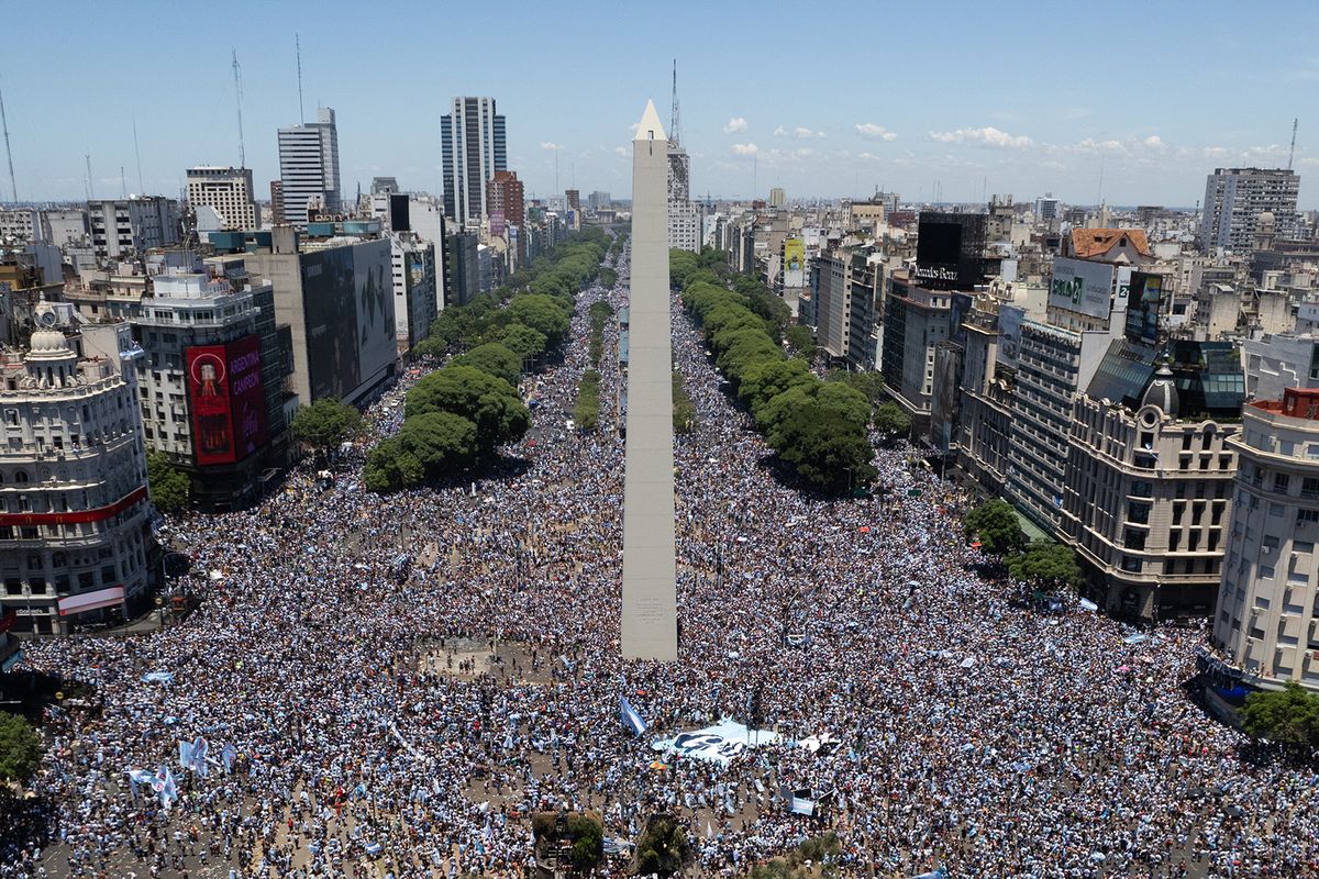 BUENOS AIRES - ARGENTINA, DECEMBER 20: An aerial view of a massive crowd celebrating their nation’s third World Cup victory, in the capital Buenos Aires, Argentina on December 20, 2022. On Sunday, Messi-led Argentina beat France 4-2 on penalties in Qatar to bag the nation's third FIFA World Cup title. Martin Cossarini / Anadolu Agency (Photo by Martin Cossarini / ANADOLU AGENCY / Anadolu via AFP)