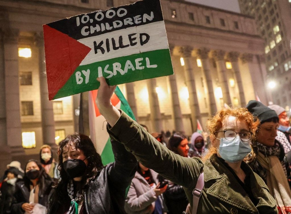 Pro-Palestinian protesters swarm Zuccotti Park, World Trade Center and Wall Street in New York City