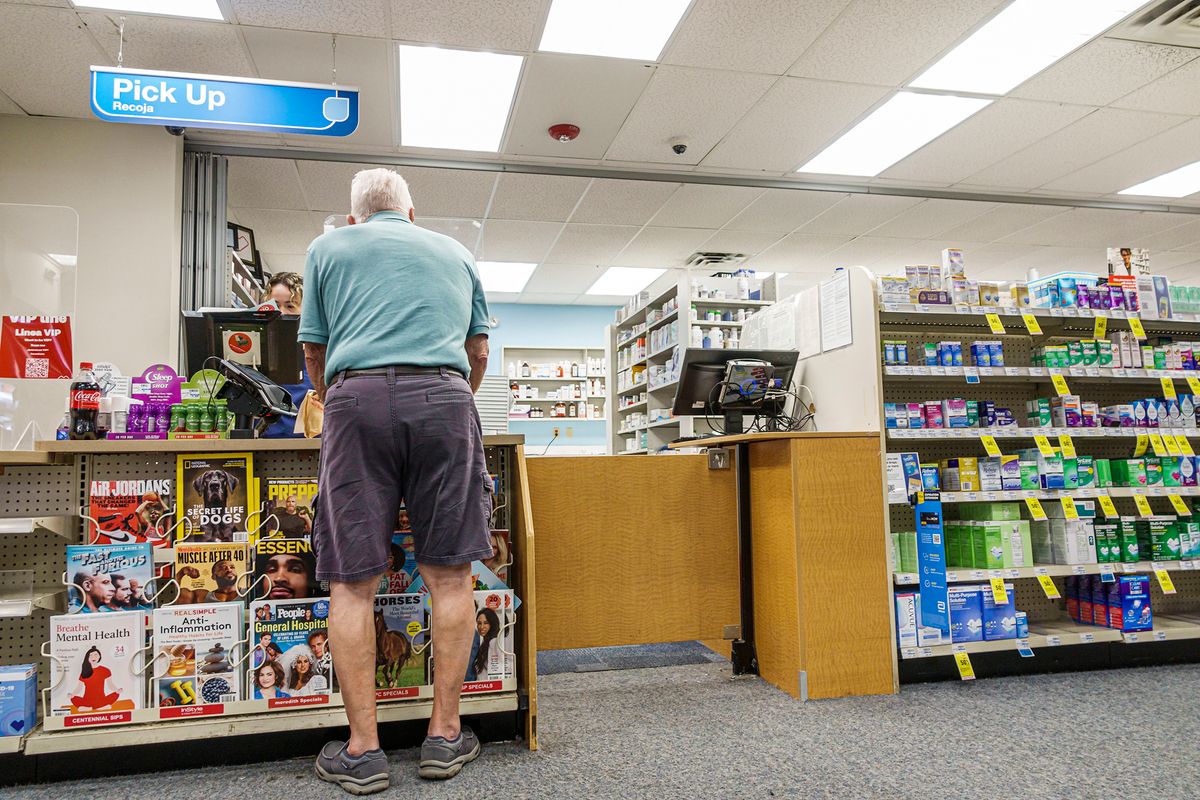 Miami Beach, Florida, Walgreens Pharmacy, senior male man customer picking up medication
