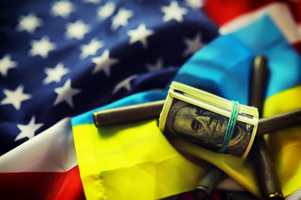 American,And,Ukrainian,Flags,,A,Pack,Of,American,Dollars.,Aid