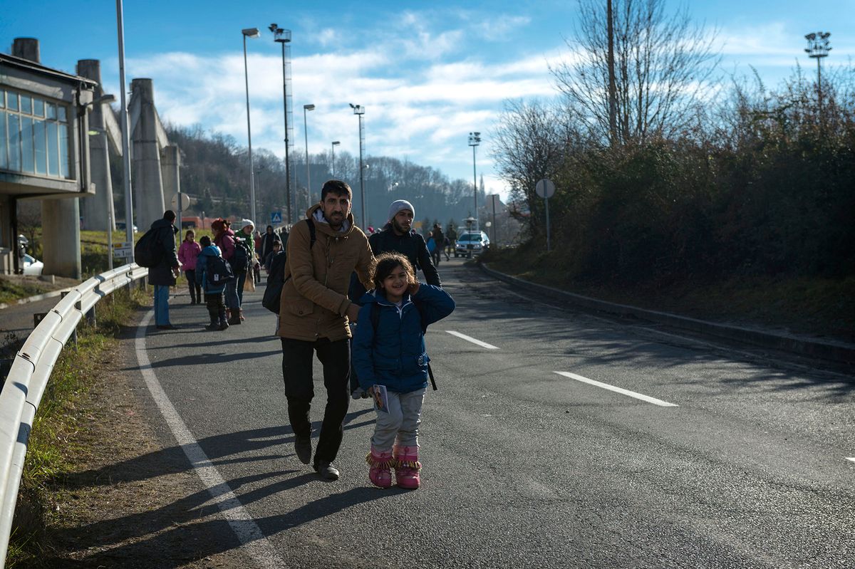 Europe's migrant crisis - SLOVENIA
Hundreds of refugees after refreshments and taking warm clothes for the winter, continue their journey across the Slovenian border arriving in Austria. Sentilj, November 29, 2015. (Photo by Fabrizio Di Nucci/NurPhoto) (Photo by Fabrizio Di Nucci / NurPhoto / NurPhoto via AFP)