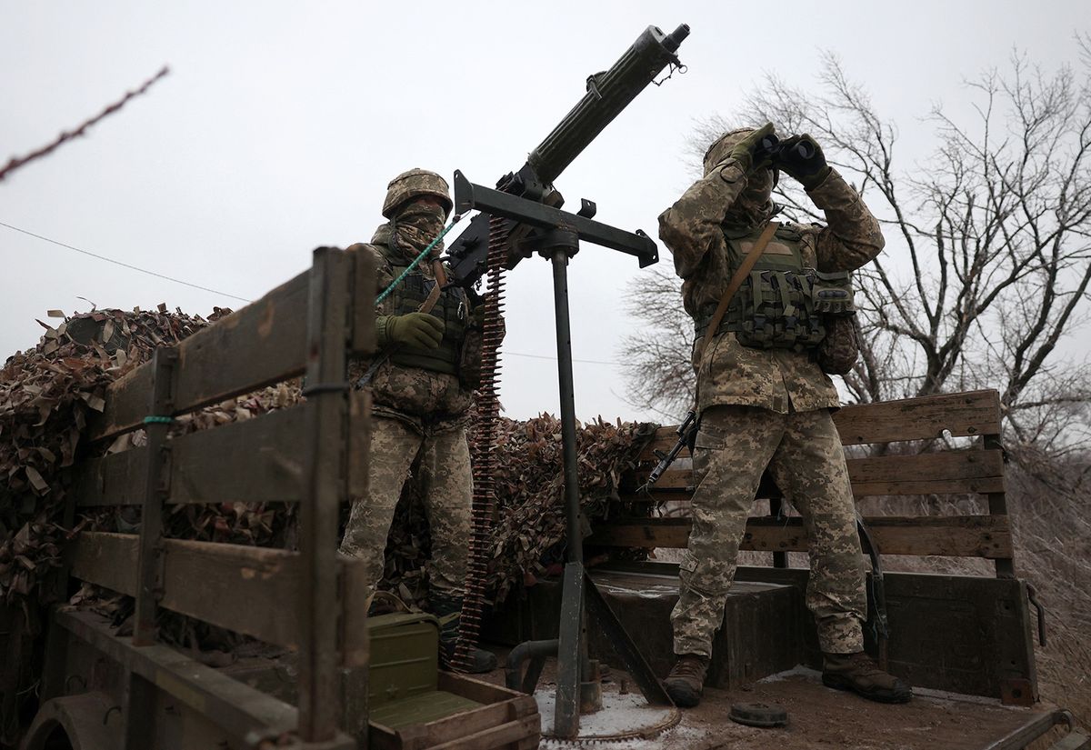 Ukrainian soldiers monitor the sky at their position in the Donetsk region, on December 10, 2023, amid the Russian invasion of Ukraine. (Photo by Anatolii Stepanov / AFP)