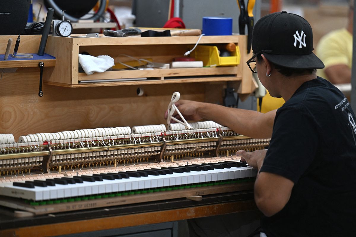 For classical star Lang Lang, musicians must 'bridge' cultures
A worker builds the "Steinway X Disney: Mickey Mouse Limited Edition" piano at Steinway & Sons Factory in New York on October 10, 2023. Lang Lang, one of the world's most influential classical artists, says that musicians must always act as a "bridge" between cultures, but even more so during times of crisis. Lang Lang recently introduced a "Steinway X Disney" limited edition piano handpainted with the likeness of Mickey Mouse. (Photo by ANGELA WEISS / AFP)