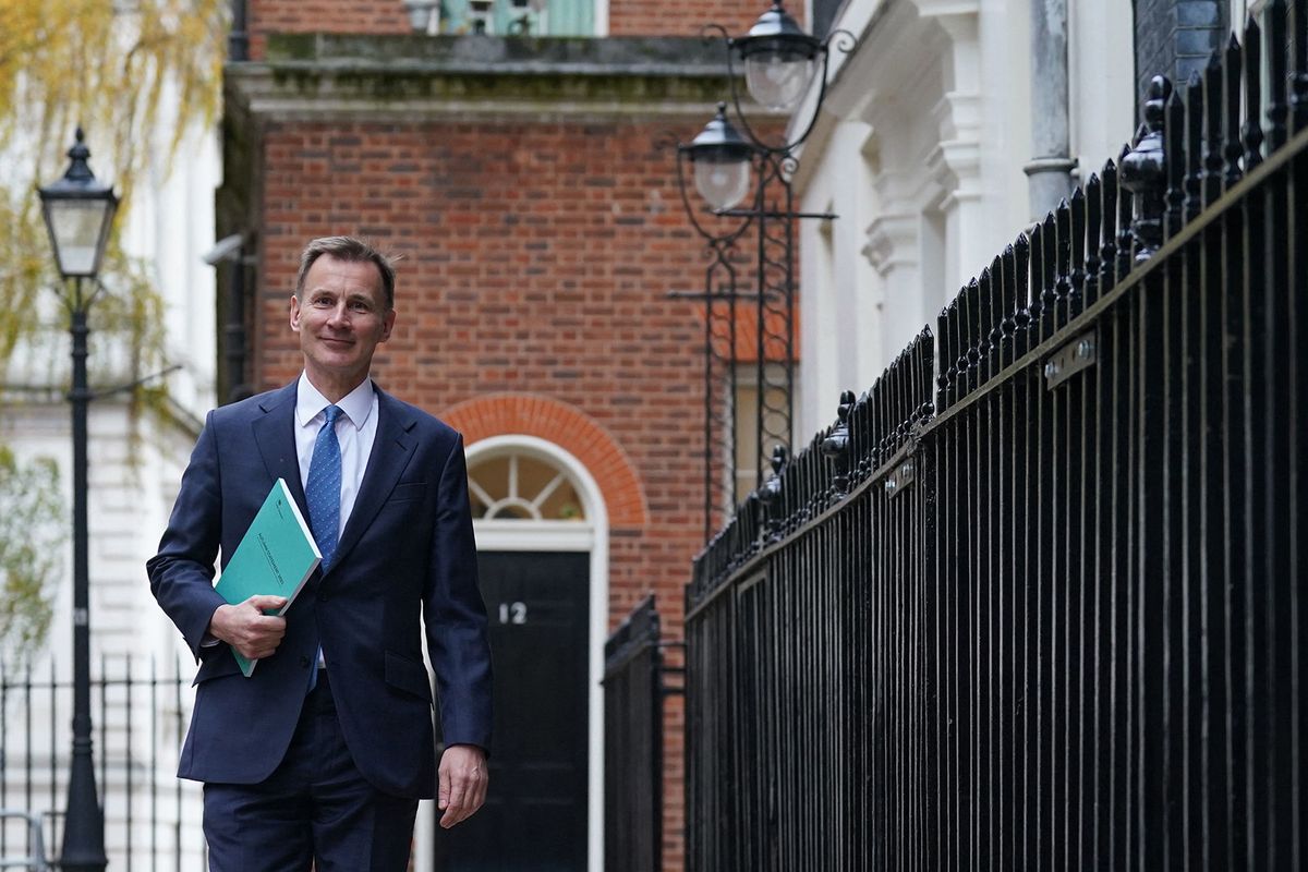 Britain's Chancellor of the Exchequer Jeremy Hunt leaves 11 Downing Street to present his Autumn Budget Statement at the House of Commons in London on November 22, 2023. (Photo by Stefan Rousseau / POOL / AFP)