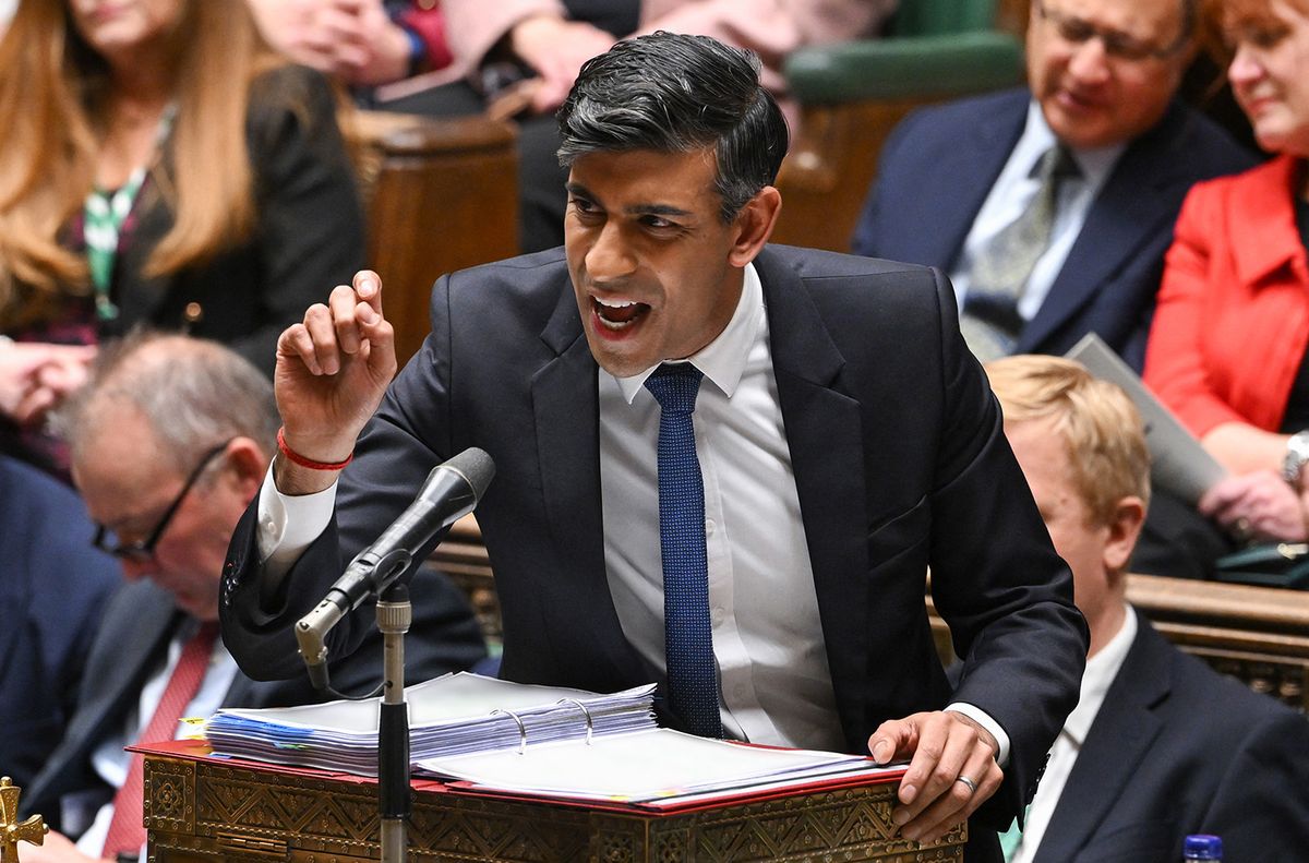 A handout photograph released by the UK Parliament shows Britain's Prime Minister Rishi Sunak speaking during the Prime Ministers' Questions (PMQs) in the House of Commons, in London, on December 13, 2023. (Photo by JESSICA TAYLOR / UK PARLIAMENT / AFP) / RESTRICTED TO EDITORIAL USE - NO USE FOR ENTERTAINMENT, SATIRICAL, ADVERTISING PURPOSES - MANDATORY CREDIT " AFP PHOTO / Jessica Taylor / UK Parliament"