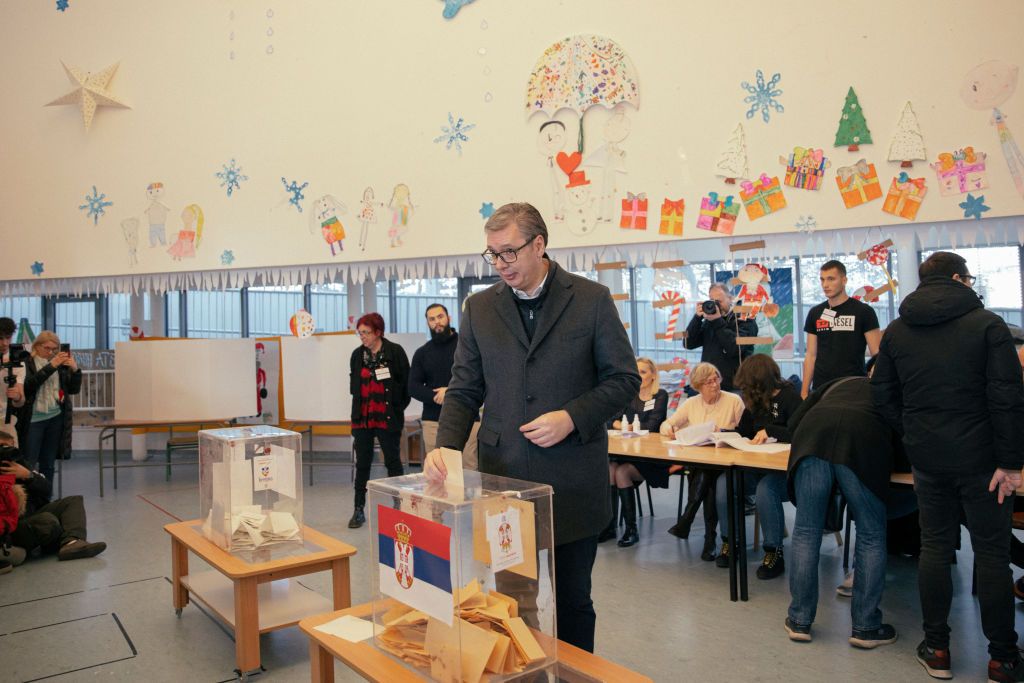 Snap Elections In Serbia Amid Heavy Political ScrutinyBELGRADE, SERBIA - DECEMBER 17: Serbian President Aleksandar Vucic (C) casts his ballot at a polling station during parliamentary and local elections on December 17, 2023 in Belgrade, Serbia. Some 6.5 million Serbs  are set to vote in early legislative elections, the Serbian Progress Party (SNS) of populist President Aleksandar Vucic is expected to win against the united opposition. (Photo by Vladimir Zivojinovic/Getty Images)