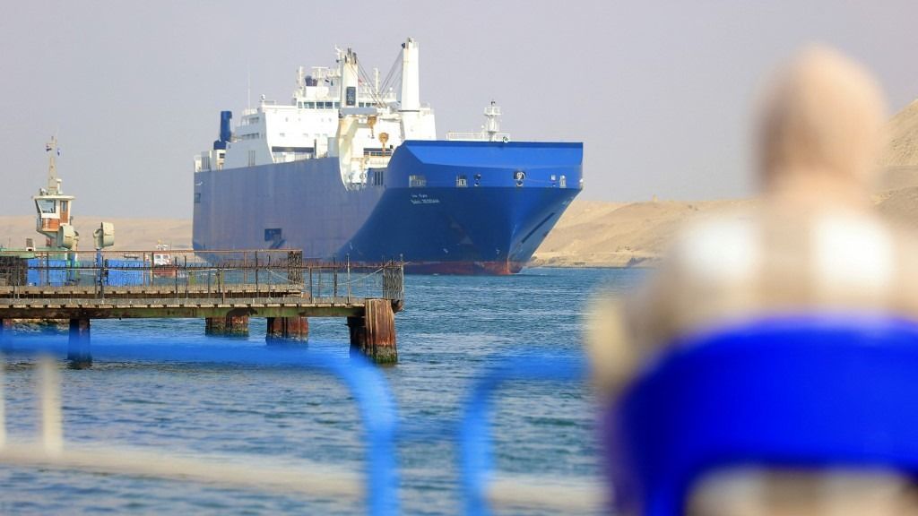 The largest source of foreign currency for the Egyptian economy: Suez CanalISMAILIA, EGYPT - DECEMBER 28: A cargo ship crosses the Suez Canal, one of the most critical human-made waterways, in Ismailia, Egypt on December 29, 2023. The Suez Canal remains important for both world trade and the Egyptian economy, even though 154 years have passed since it was put into service. The Suez Canal, which was opened on November 17, 1869, when Egypt was among the Ottoman lands, and is today located within the borders of Egypt, connects the Red Sea to the Mediterranean. The 193-kilometer-long canal, built by human hands, is among the most crowded water canals in the world. Simultaneously with Israel's attacks on Gaza, the Ben Gurion Canal Project, which was first proposed as an alternative to the Suez Canal in the 1960s, became the focus of discussions. Many companies temporarily removed the Red Sea from their itineraries after the Houthis in Yemen, who reacted to Israel's war in Gaza, 'make life unbearable for' the Red Sea to ships belonging to or going there. Fareed Kotb / Anadolu (Photo by Fareed Kotb / ANADOLU / Anadolu via AFP) Vörös-tenger
