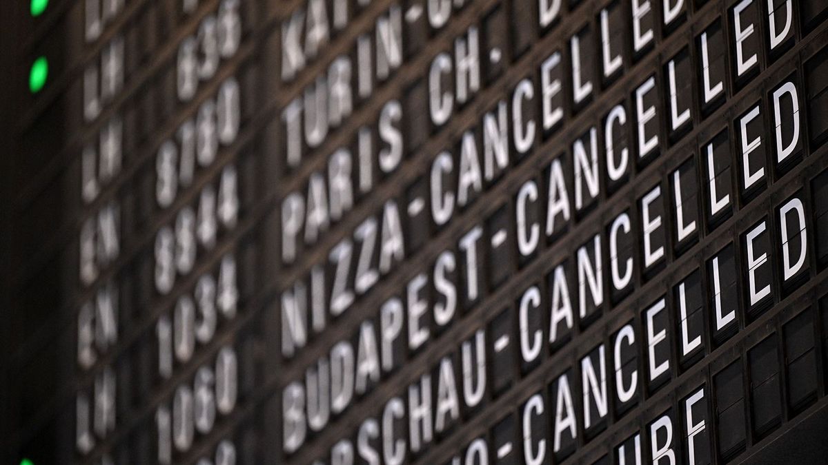 Cancelled flights are displayed on a board at the airport in Frankfurt am Main, western Germany, on January 17, 2024, as severe winter weather warnings prompted the cancellation of hundreds of flights. A Frankfurt airport spokeswoman said 570 of 1,047 flights had been axed from the schedule as Germany's business capital prepares for dramatic weather conditions. (Photo by Kirill KUDRYAVTSEV / AFP)