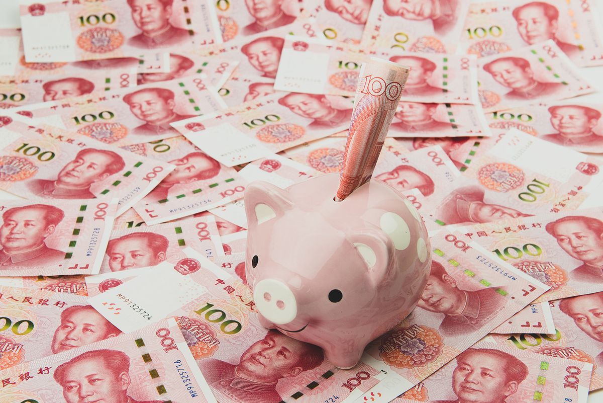 Pink,Piggy,Bank,And,Chinese,Dollar,Currency,Notes..,Chinese,Currency