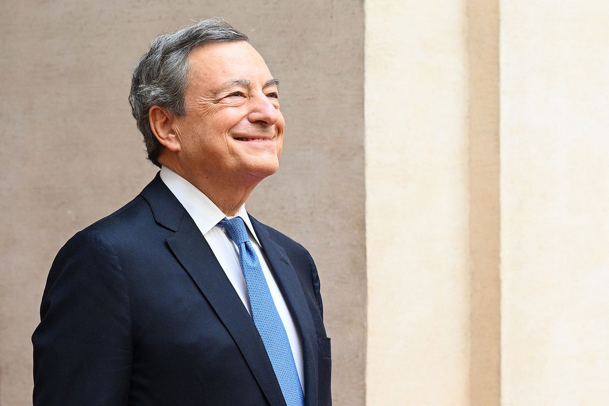 Italy's outgoing Prime Minister, Mario Draghi smiles as he leaves after a handover ceremony at Palazzo Chigi in Rome on October 23, 2022. Far-right leader Giorgia Meloni was named Italian prime minister on October 21, 2022 after her party's historic election win, becoming the first woman to head a government in Italy. (Photo by Vincenzo PINTO / AFP)