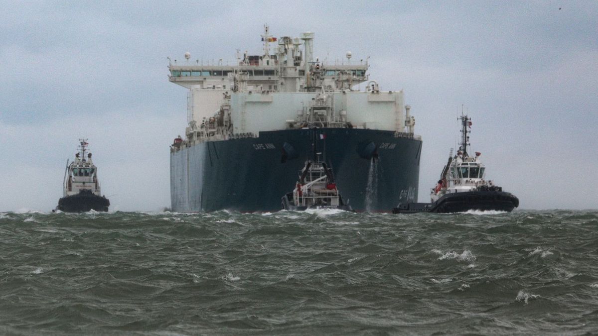 The TotalEnergies Cape Ann LNG tanker ship, escorted by maritime gendarmerie, arrives at the northern French port city of Le Havre, in the English Channel on September 18, 2023. (Photo by LOU BENOIST / AFP)