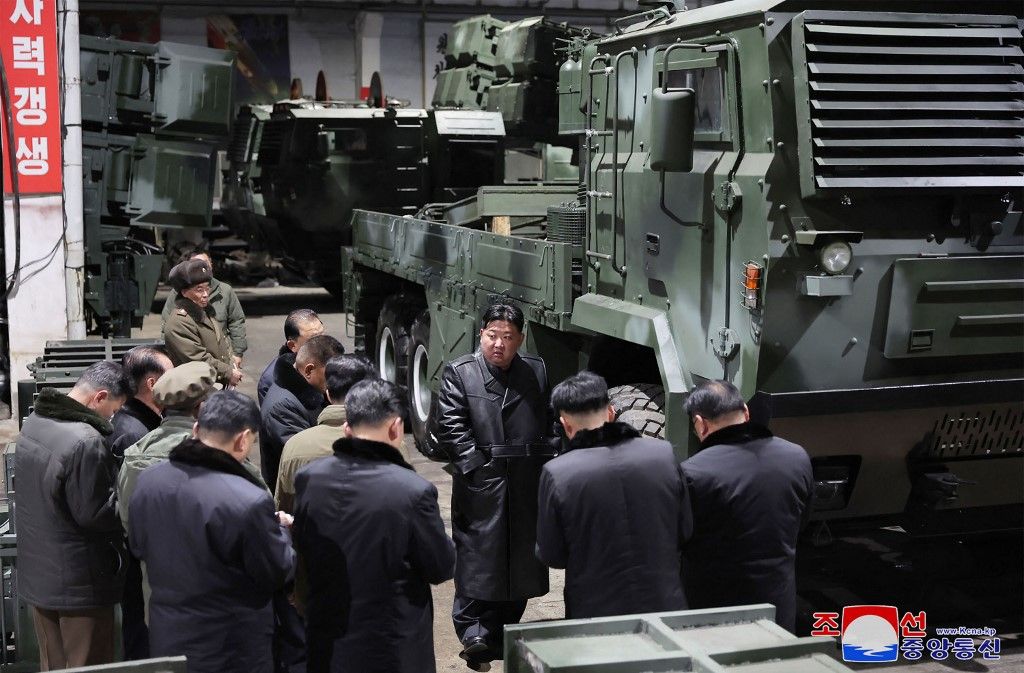 This undated picture taken by North Korea's official Korean Central News Agency (KCNA) and released on January 10, 2024 shows North Korean leader Kim Jong Un (C) inspecting a major munitions factory to learn about the production of weapons and equipment at an undisclosed location in North Korea. (Photo by KCNA VIA KNS / AFP) / - South Korea OUT / ---EDITORS NOTE--- RESTRICTED TO EDITORIAL USE - MANDATORY CREDIT "AFP PHOTO/KCNA VIA KNS" - NO MARKETING NO ADVERTISING CAMPAIGNS - DISTRIBUTED AS A SERVICE TO CLIENTS
THIS PICTURE WAS MADE AVAILABLE BY A THIRD PARTY. AFP CAN NOT INDEPENDENTLY VERIFY THE AUTHENTICITY, LOCATION, DATE AND CONTENT OF THIS IMAGE. / 