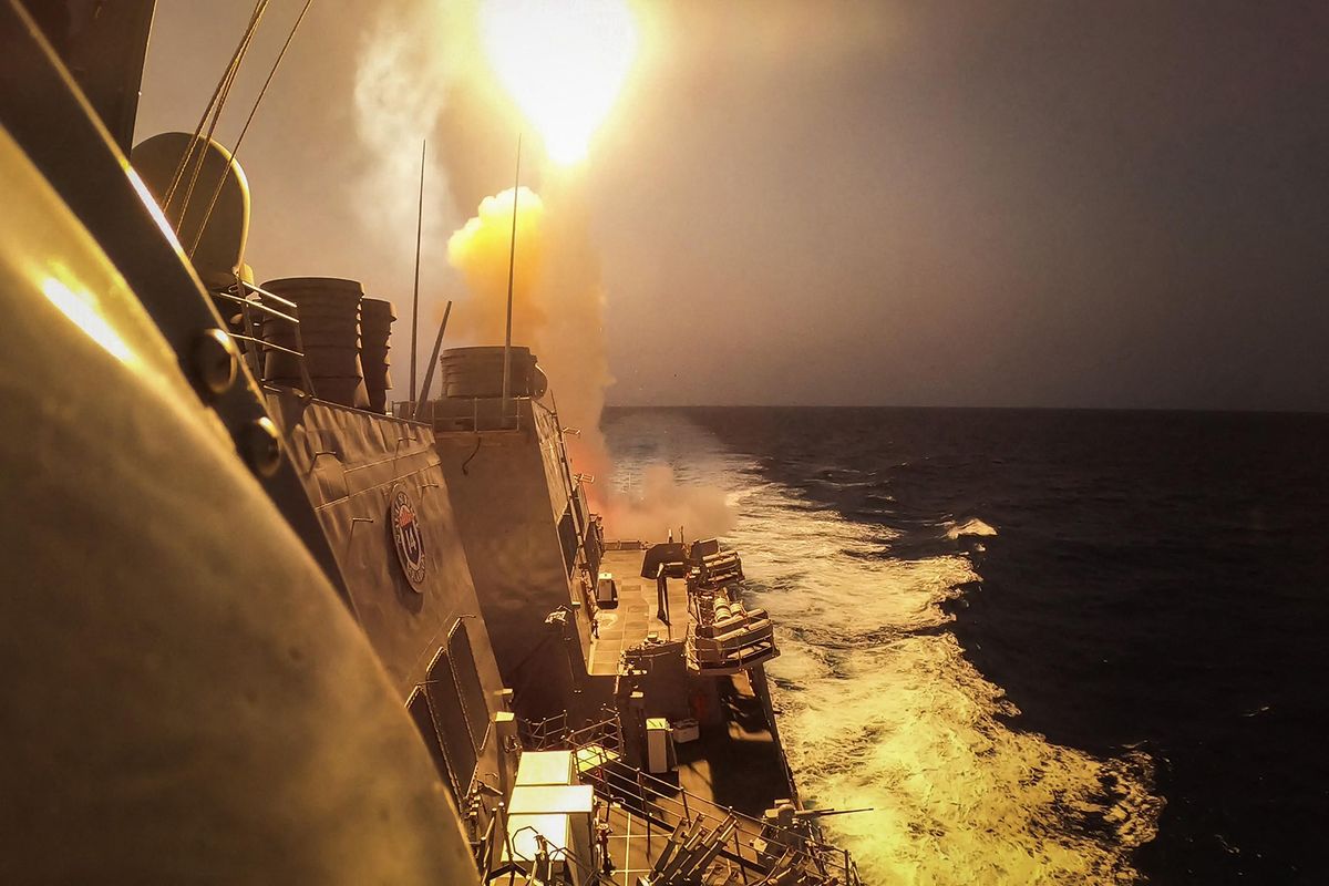 This handout picture courtesy of the US Navy taken on October 19, 2023 shows the Arleigh Burke-class guided-missile destroyer USS Carney (DDG 64) defeating a combination of Houthi missiles and unmanned aerial vehicles in the Red Sea. A US Navy ship in the Red Sea on October 19, 2023 shot down missiles and drones that had been fired by Iran-backed Huthi rebels in Yemen, possibly at Israel, the Pentagon said. Three "land-attack cruise missiles and several drones" were intercepted by a destroyer, Pentagon spokesman Brigadier General Pat Ryder told reporters. The attack was "launched by Huthi forces in Yemen" potentially toward targets in Israel, he added. Thousands of civilians, both Palestinians and Israelis, have died since October 7, 2023, after Palestinian Hamas militants based in the Gaza Strip entered southern Israel in an unprecedented attack triggering a war declared by Israel on Hamas with retaliatory bombings on Gaza. (Photo by Aaron Lau / US NAVY / AFP) / RESTRICTED TO EDITORIAL USE - MANDATORY CREDIT "AFP PHOTO / ASSEMBLEE NATIONALE 2022" - NO MARKETING NO ADVERTISING CAMPAIGNS - DISTRIBUTED AS A SERVICE TO CLIENTS