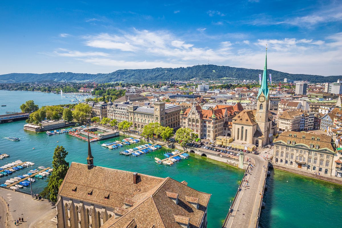 Aerial,View,Of,Historic,Zurich,City,Center,With,Famous,Fraumunster