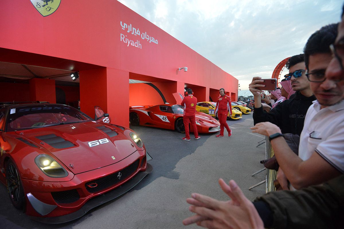 Ferrari race cars are displayed in a special section of the Riyadh Motor Show, at Al-Janadriyah village in the Saudi capital, on November 24, 2019. (Photo by FAYEZ NURELDINE / AFP)