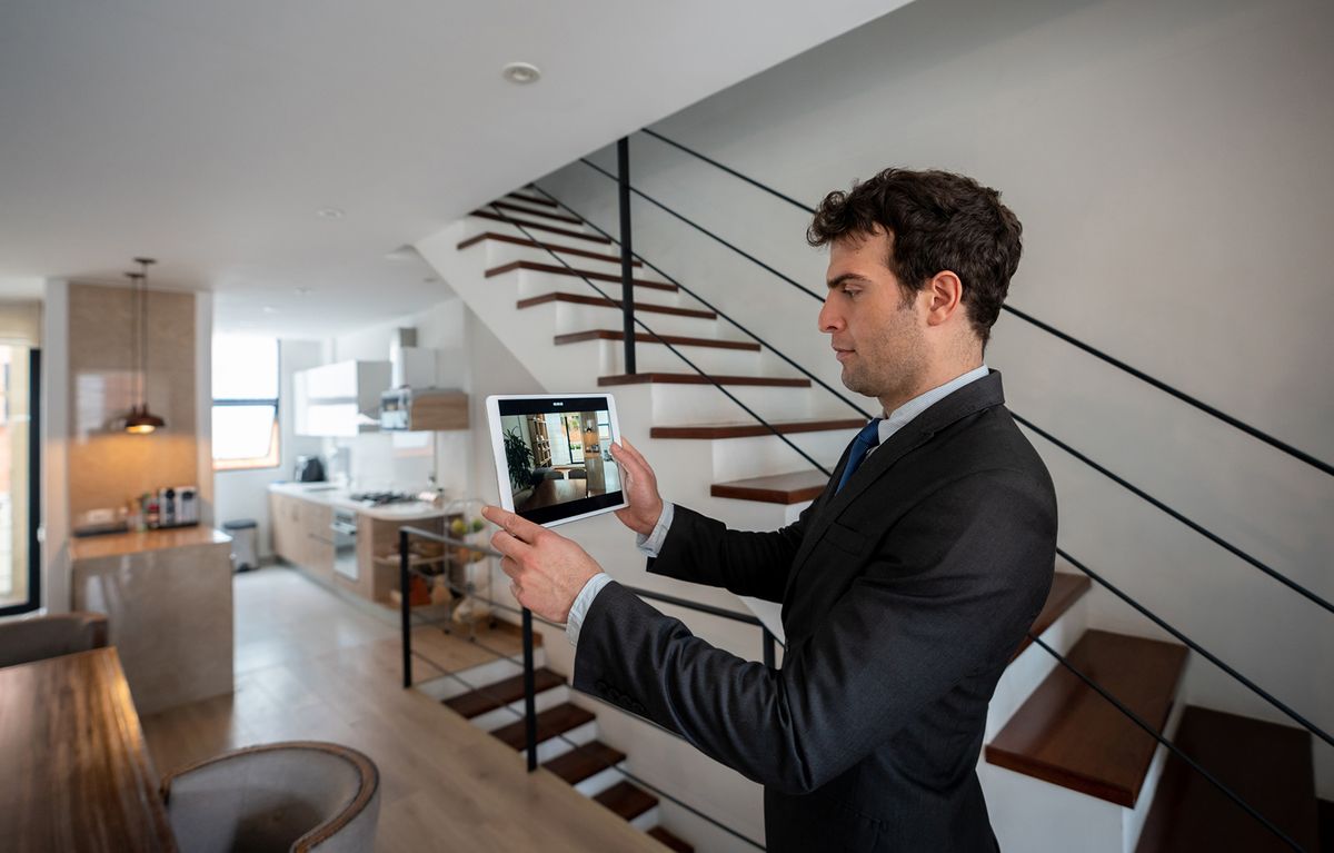 Real estate agent making a virtual tour of a house