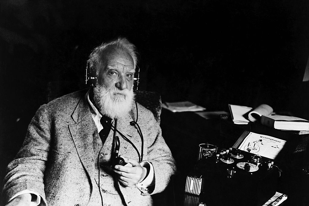 Alexander Graham Bell, ca. 1915Portrait of Alexander Graham Bell (1847-1922), inventor of the telephone. He wears headphones that are attached to a piece of electrical apparatus. (Photo by © CORBIS/Corbis via Getty Images)