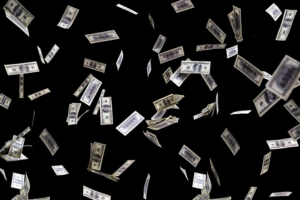 Hundred,Dollars,Banknotes,Fly,On,Black,Background.,Money,Rain,Concept