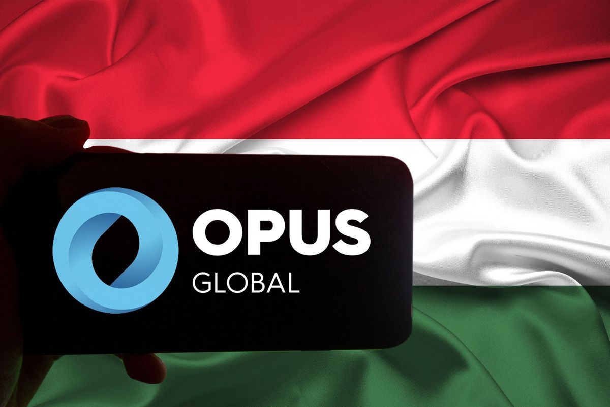 xHungarian BUX Companies
The logo of Opus is seen on a screen of a smartphone in front of a hungarian flag. It is part of the BUX, the major index of Hungary. Opus primarily works on management and trusteeship of companies with different profiles as a financial investor in holding structure. (Photo by Alexander Pohl/NurPhoto) (Photo by Alexander Pohl / NurPhoto / NurPhoto via AFP)