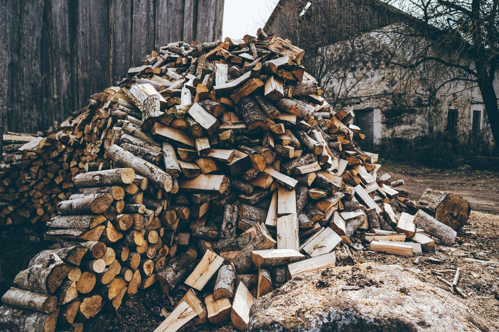 Winter,Preparation.,Stacking,Firewood.,Pile,Of,Firewood,Loggs.,Firewood,Background.