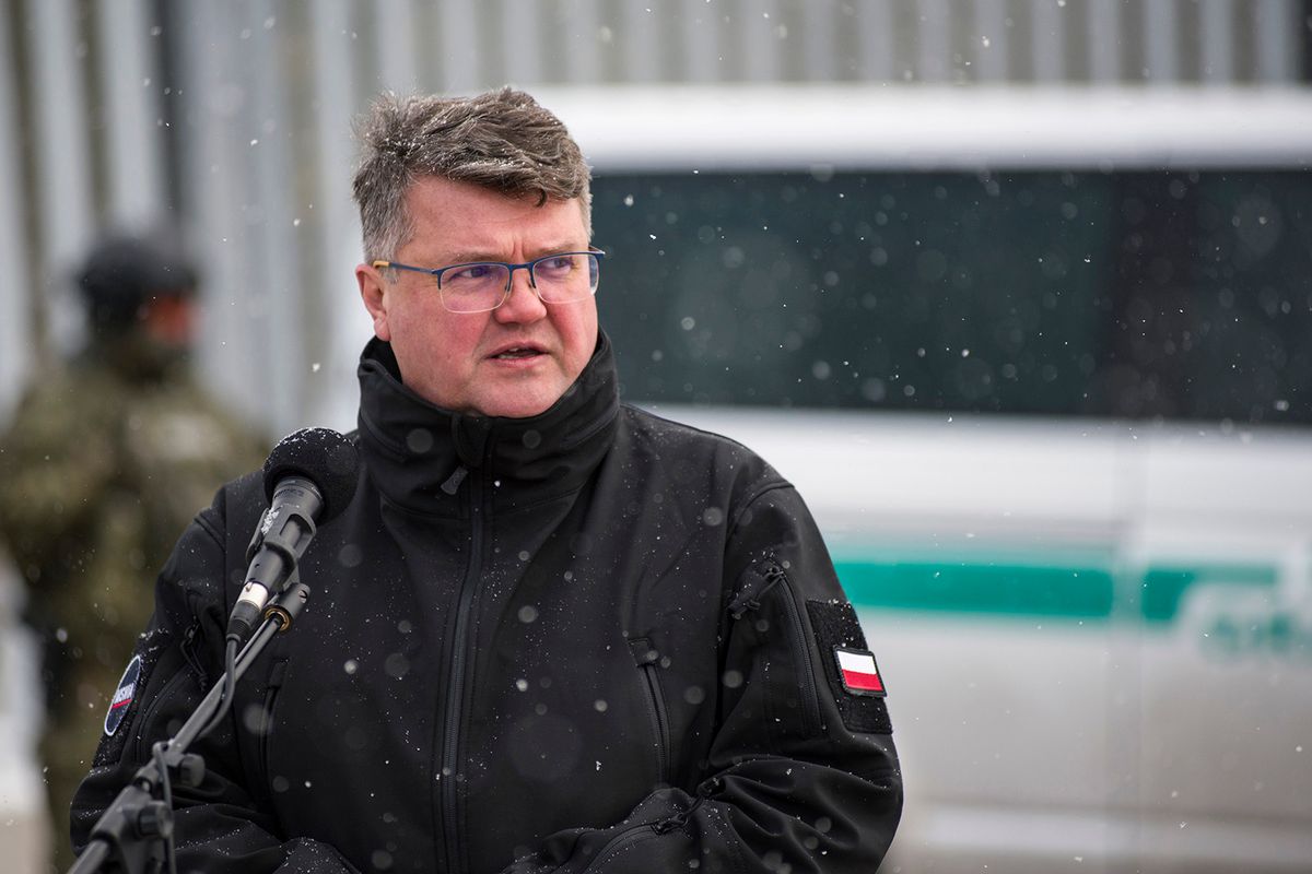 NOMIKI, PODLASKIE, POLAND - 2022/11/18: Deputy Minister of the Ministry of Interior and Administration, Maciej Wasik is seen during the press conference at the border wall near Nomiki village. Polands Interior Minister Mariusz Kaminski inspected the initial installation phase of high-tech monitoring equipment along a metal wall on the border with Belarus geared toward preventing thousands of migrants from crossing into the European Union.The head of the Ministry of Interior and Administration announced the completion of works on the first section of the electronic barrier on the border with Belarus. Kaminski also said that the 5.5-meter (17-feet) high wall has slashed crossing attempts tenfold. (Photo by Attila Husejnow/SOPA Images/LightRocket via Getty Images)