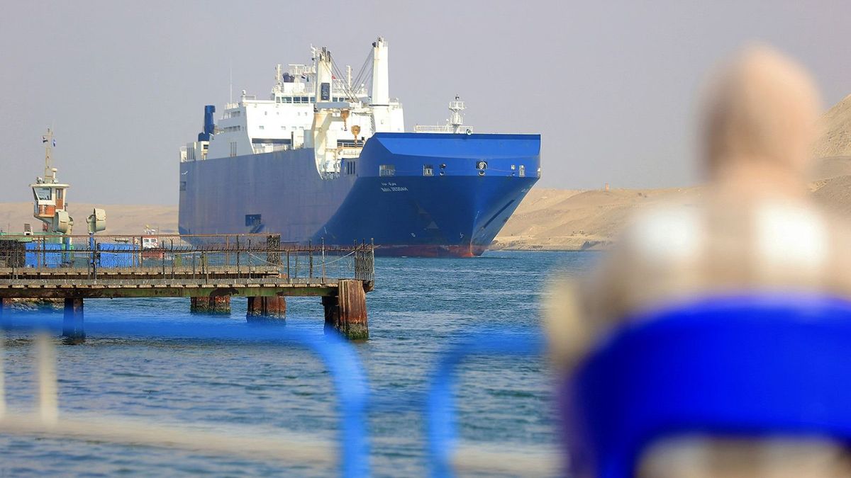 ISMAILIA, EGYPT - DECEMBER 28: A cargo ship crosses the Suez Canal, one of the most critical human-made waterways, in Ismailia, Egypt on December 29, 2023. The Suez Canal remains important for both world trade and the Egyptian economy, even though 154 years have passed since it was put into service. The Suez Canal, which was opened on November 17, 1869, when Egypt was among the Ottoman lands, and is today located within the borders of Egypt, connects the Red Sea to the Mediterranean. The 193-kilometer-long canal, built by human hands, is among the most crowded water canals in the world. Simultaneously with Israel's attacks on Gaza, the Ben Gurion Canal Project, which was first proposed as an alternative to the Suez Canal in the 1960s, became the focus of discussions. Many companies temporarily removed the Red Sea from their itineraries after the Houthis in Yemen, who reacted to Israel's war in Gaza, 'make life unbearable for' the Red Sea to ships belonging to or going there. Fareed Kotb / Anadolu (Photo by Fareed Kotb / ANADOLU / Anadolu via AFP)