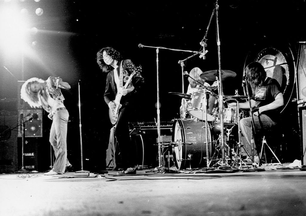 Led Zeppelin At The ForumLOS ANGELES - JUNE 03: Rock band 'Led Zeppelin' performs onstage at the Forum on June 3, 1973 in Los Angeles, California. (L-R) Robert Plant, John Paul Jones, Jimmy Page, John Bonham. (Photo by Michael Ochs Archives/Getty Images)
