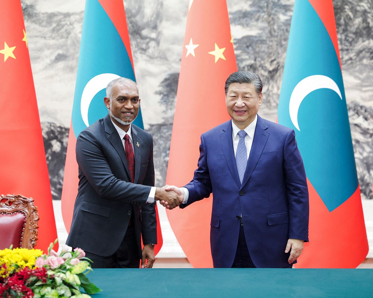 (240110) -- BEIJING, Jan. 10, 2024 (Xinhua) -- Chinese President Xi Jinping and President of the Republic of Maldives Mohamed Muizzu witness the signature of bilateral cooperation documents after their talks at the Great Hall of the People in Beijing, capital of China, Jan. 10, 2024. Xi held talks with Muizzu, who is paying a state visit to China, in Beijing on Wednesday. (Xinhua/Liu Bin) (Photo by LIU BIN / XINHUA / Xinhua via AFP)